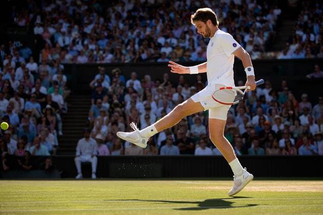 Mandatory Credit: Photo by Ella Ling Shutterstock (13018049ag) Cameron Norrie kicking the tennis ball during his semi-final match Wimbledon Tennis Championships, Day 12, The All England Lawn Tennis and Croquet Club, London, UK - 08 Jul 2022 Wimbledon Tennis Championships, Day 12, The All England Lawn Tennis and Croquet Club, London, UK - 08 Jul 2022  Copyright: xEllaxLing Shutterstockx 13018049ag