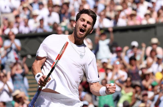 Great Britain s Cameron Norrie celebrates a point in his Semi-Final match against Serbian Novak Djokovic on day twelve of the 2022 Wimbledon championships in London on Friday, July 08, 2022. Djokovic won the match 2-6,6-3,6-2,6-4.  LON2022070816 HUGOxPHILPOTT