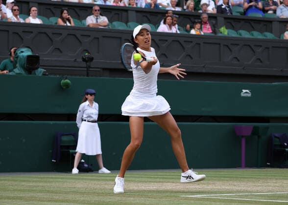 8th July 2022, All England Lawn Tennis and Croquet Club, London, England; Wimbledon Tennis tournament; Shuai Zhang (CHN) plays a forehand to Danielle Collins (USA) in the womens doubles semi-final  ActionPlus12406300 JohnxPatrickxFletcher