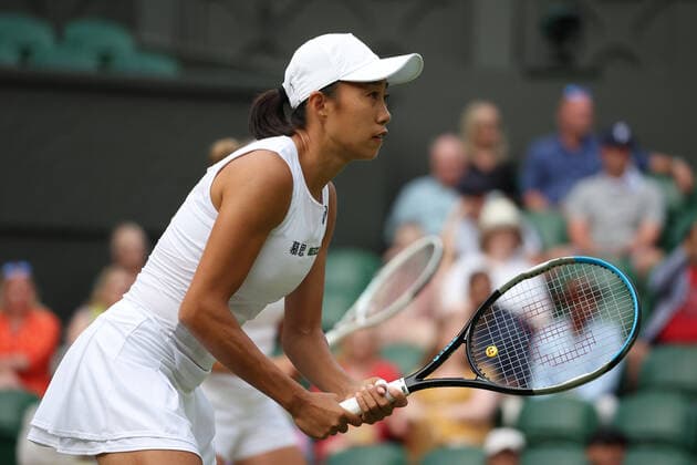 8th July 2022, All England Lawn Tennis and Croquet Club, London, England; Wimbledon Tennis tournament; Shuai Zhang (CHN) in the womens doubles semi-final  ActionPlus12406303 JohnxPatrickxFletcher