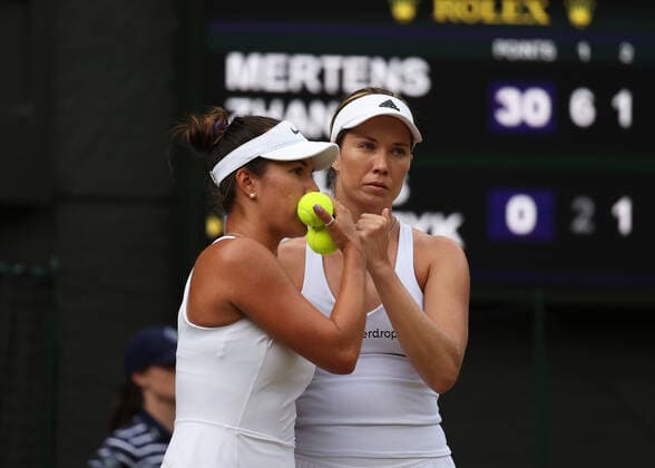 8th July 2022, All England Lawn Tennis and Croquet Club, London, England; Wimbledon Tennis tournament; Desirae Krawczyk (USA) talking tactics with doubles partner Danielle Collins (USA) in the womens doubles semi-final  ActionPlus12406313 JohnxPatrickxFletcher