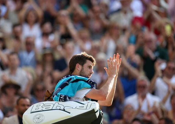 (220709) -- LONDON, July 9, 2022 -- Cameron Norrie of Great Britain leaves the court after the men s singles semifinal match against Novak Djokovic of Serbia at Wimbledon Tennis Championship in London, Britain, on July 8, 2022. ) (SP)BRITAIN-LONDON-TENNIS-WIMBLEDON-MEN S SINGLES-SEMIFINALS LixYing 