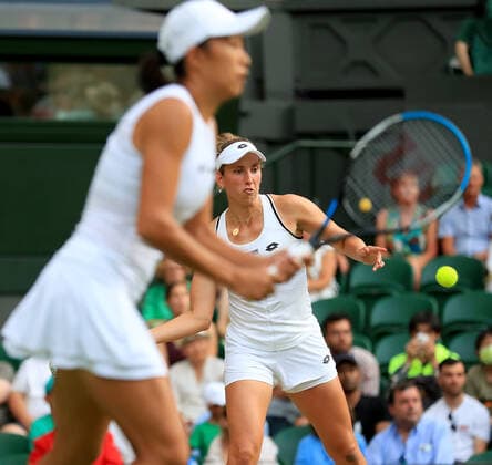 (220709) -- LONDON, July 9, 2022 -- Zhang Shuai of China Elise Mertens(R) of Belgium compete during the women s doubles semifinal match against Danielle Collins Desirae Krawczyk of the United States at Wimbledon Tennis Championship in London, Britain, on July 8, 2022. ) (SP)BRITAIN-LONDON-TENNIS-WIMBLEDON-WOMEN S DOUBLES-SEMIFINALS LixYing 
