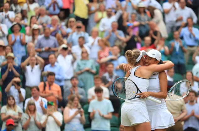 (220709) -- LONDON, July 9, 2022 -- Zhang Shuai (R) of China Elise Mertens of Belgium celebrate after winning the women s doubles semifinal match against Danielle Collins Desirae Krawczyk of the United States at Wimbledon Tennis Championship in London, Britain, on July 8, 2022. ) (SP)BRITAIN-LONDON-TENNIS-WIMBLEDON-WOMEN S DOUBLES-SEMIFINALS LixYing 