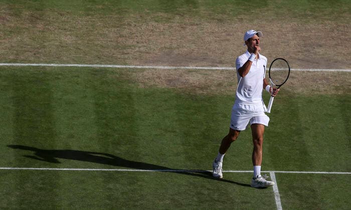 (220709) -- LONDON, July 9, 2022 -- Novak Djokovic of Serbia celebrates during the men s singles semifinal match against Cameron Norrie of Great Britain at Wimbledon Tennis Championship in London, Britain, on July 8, 2022. ) (SP)BRITAIN-LONDON-TENNIS-WIMBLEDON-MEN S SINGLES-SEMIFINALS HanxYan 