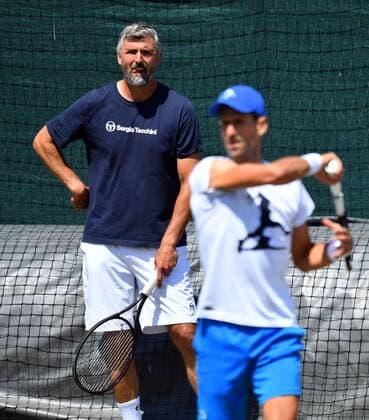 Mandatory Credit: Photo by James Veysey Shutterstock (13018056e) Novak Djokovic practicing with Goran Ivanisevic Wimbledon Tennis Championships, Day 13, The All England Lawn Tennis and Croquet Club, London, UK - 09 Jul 2022 Wimbledon Tennis Championships, Day 13, The All England Lawn Tennis and Croquet Club, London, UK - 09 Jul 2022  Copyright: xJamesxVeysey Shutterstockx 13018056e