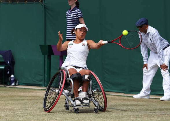 9th July 2022, All England Lawn Tennis and Croquet Club, London, England; Wimbledon Tennis tournament, ladies wheelchair singles final; Yui Kamiji (JPN) plays a forehand to Diede de Groot (NED)  ActionPlus12406578 JohnxPatrickxFletcher