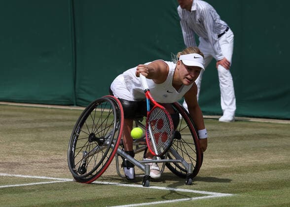 9th July 2022, All England Lawn Tennis and Croquet Club, London, England; Wimbledon Tennis tournament, ladies wheelchair singles final; Diede de Groot (NED) plays a backhand to Yui Kamiji (JPN)  ActionPlus12406587 JohnxPatrickxFletcher