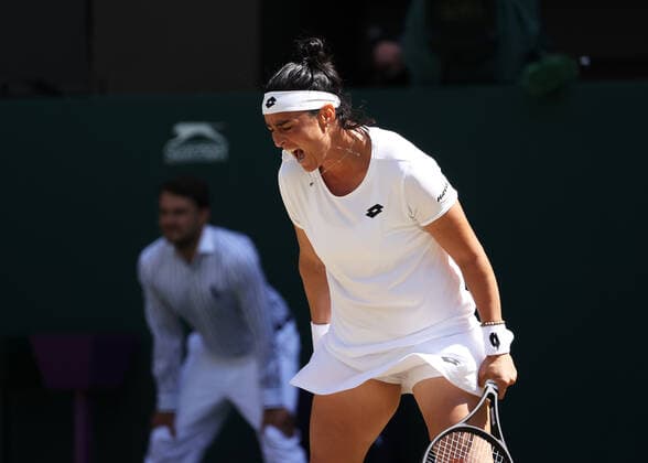 9th July 2022, All England Lawn Tennis and Croquet Club, London, England; Wimbledon Tennis tournament, womens singles final; Ons Jabeur (TUN) celebrates winning a game against Elena Rybakina (KAZ)  ActionPlus12406624 JohnxPatrickxFletcher