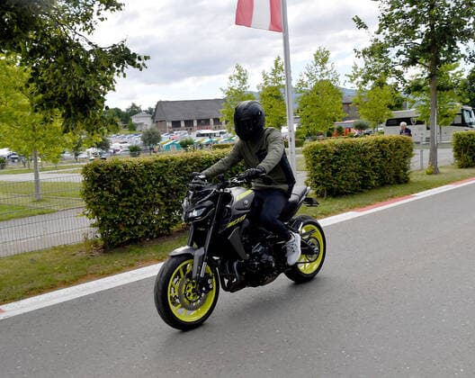 09 07 2022, Red Bull Ring , Spielberg, Formula 1 BWT Austrian Grand Prix 2022 , in the picture Mick Schumacher DEU , Haas F1 Team comes with the motorcycle driven into the paddock Photo EU Images Spielberg Red Bull Ring Styria Austria  eu-images-506