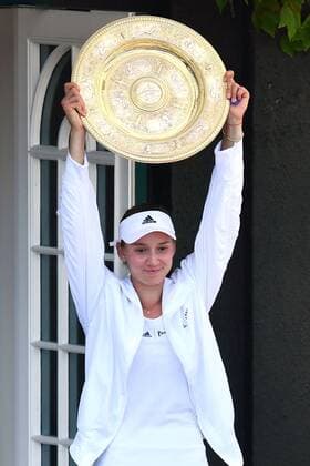 Mandatory Credit: Photo by James Veysey Shutterstock (13018056as) Elena Rybakina appears on the Centre Court Members balcony after victory in the Ladies Singles Final Wimbledon Tennis Championships, Day 13, The All England Lawn Tennis and Croquet Club, London, UK - 09 Jul 2022 Wimbledon Tennis Championships, Day 13, The All England Lawn Tennis and Croquet Club, London, UK - 09 Jul 2022  Copyright: xJamesxVeysey Shutterstockx 13018056as