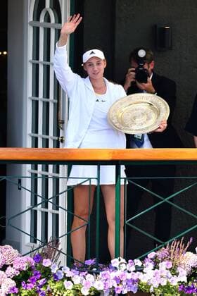 Mandatory Credit: Photo by James Veysey Shutterstock (13018056at) Elena Rybakina appears on the Centre Court Members balcony after victory in the Ladies Singles Final Wimbledon Tennis Championships, Day 13, The All England Lawn Tennis and Croquet Club, London, UK - 09 Jul 2022 Wimbledon Tennis Championships, Day 13, The All England Lawn Tennis and Croquet Club, London, UK - 09 Jul 2022  Copyright: xJamesxVeysey Shutterstockx 13018056at