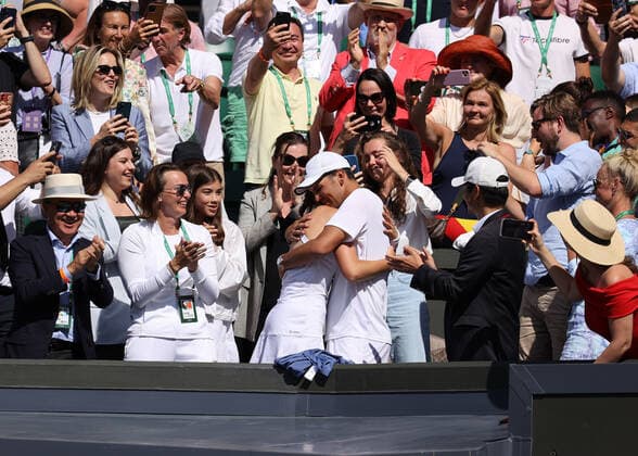 9th July 2022, All England Lawn Tennis and Croquet Club, London, England; Wimbledon Tennis tournament, womens singles final; Elena Rybakina (KAZ) hugging her coaches and family in the stands after defeating Ons Jabeur (TUN) by two sets  ActionPlus12406707 JohnxPatrickxFletcher