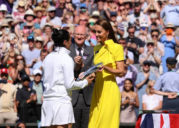 9th July 2022, All England Lawn Tennis and Croquet Club, London, England; Wimbledon Tennis tournament, womens singles final; Kate Middleton, Duchess of Cambridge on Centre Court to presents Ons Jabeur (TUN) with the runners up plate  ActionPlus12406712 JohnxPatrickxFletcher