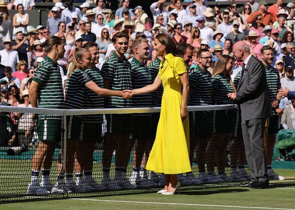 9th July 2022, All England Lawn Tennis and Croquet Club, London, England; Wimbledon Tennis tournament, womens singles final; Kate Middleton, Duchess of Cambridge on Centre Court thanking the ground staff  ActionPlus12406721 JohnxPatrickxFletcher
