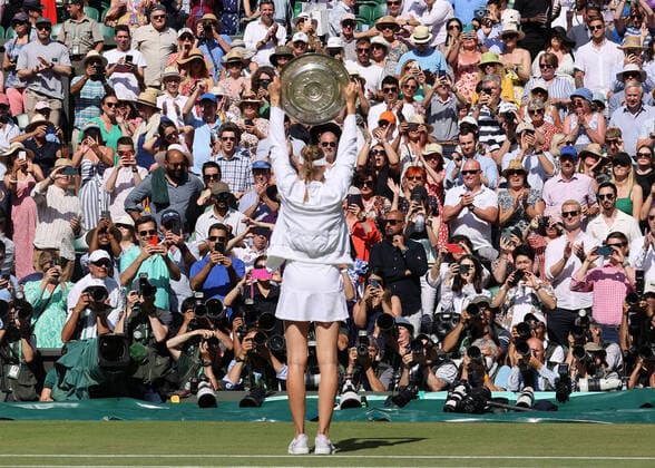 9th July 2022, All England Lawn Tennis and Croquet Club, London, England; Wimbledon Tennis tournament, womens singles final; Photographers photographing Elena Rybakina (KAZ) posing with the Wimbledon Ladies Trophy  ActionPlus12406725 JohnxPatrickxFletcher
