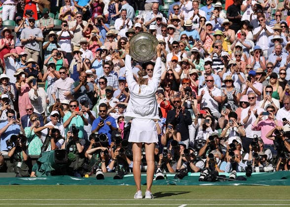 9th July 2022, All England Lawn Tennis and Croquet Club, London, England; Wimbledon Tennis tournament, womens singles final; Photographers photographing Elena Rybakina (KAZ) posing with the Wimbledon Ladies Trophy  ActionPlus12406726 JohnxPatrickxFletcher