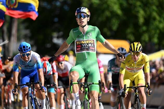 LAUSANNE, SWITZERLAND - JULY 09 : Van Aert Wout (BEL) of Team Jumbo-Visma winning today s race with Pogacar Tadej (SLO) of UAE Team Emirates and Matthews Michael (AUS) of Team BikeExchange - Jayco behind him during stage 8 of the 109th edition of the 2022 Tour de France cycling race, a stage of 184 kms with start in Dole, France and finish in Lausanne on July 09, 2022 in Lausanne, Switzerland, 09 07 2022 ( Motordriver Kenny Verfaillie - Tour de France 2022 - Stage 08 PhotoNews Panoramic 