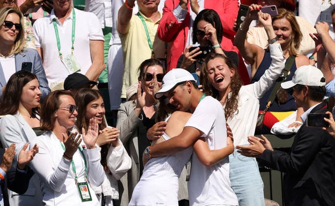Kazakhstan s Elena Rybakina celebrates with her team in her Women s Final match against Tunisian Ons Jabeur at the 2022 Wimbledon championships in London on Saturday, July 09, 2022. Rybakina won the match 3-6,6-2,6-2.  LON20220709098 HUGOxPHILPOTT