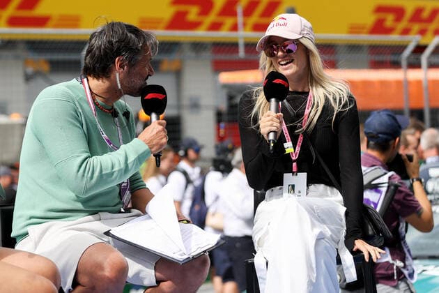 FORMULA 1 - GP of Austria 2022 SPIELBERG,AUSTRIA,09.JUL.22 - MOTORSPORTS, FORMULA 1 - Grand Prix of Austria, Red Bull Ring, sprint race. Image shows host Stefan Steinacher and Anna Gasser (AUT).  GEPAxpictures xChristianxWalgram