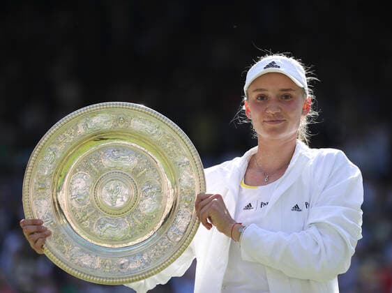 (220709) -- LONDON, July 9, 2022 -- Elena Rybakina of Kazakhstan poses with the trophy after winning the women s singles final against Ons Jabeur of Tunisia at Wimbledon Tennis Championship in London, Britain, July 9, 2022. ) (SP)BRITAIN-LONDON-TENNIS-WIMBLEDON-WOMEN S SINGLES-FINAL HanxYan 