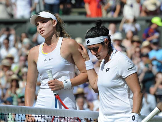 Tennis Championships - Week Two - Day Thirteen - All England Lawn Tennis Club, Wimbledon - Saturday 9th July 2022 Ladies Singles Final. Elena Rybakina (KAZ) v Ons Jabeur (TUN) Elena Rybakina (KAZ) is congratulated by Ons Jabeur at the net after winning the match 