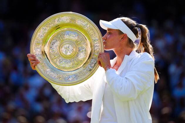 Mandatory Credit: Photo by Javier Garcia Shutterstock (13018057dp) Elena Rybakina holds aloft the Rosewater Dish after victory in Ladies Singles Final Wimbledon Tennis Championships, Day 13, The All England Lawn Tennis and Croquet Club, London, UK - 09 Jul 2022 Wimbledon Tennis Championships, Day 13, The All England Lawn Tennis and Croquet Club, London, UK - 09 Jul 2022  Copyright: xJavierxGarcia Shutterstockx 13018057dp