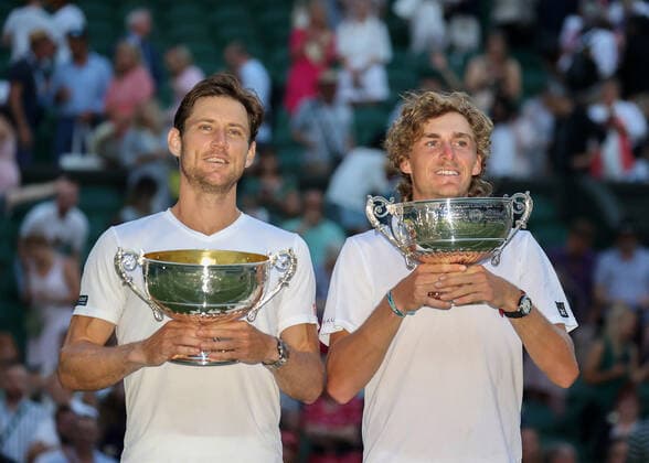 9th July 2022, All England Lawn Tennis and Croquet Club, London, England; Wimbledon Tennis tournament, womens singles final; Matthew Ebden (AUS) and Max Purcell (AUS) pose with the Gentlemen& x2019;s Doubles Trophy after defeating Nikola Mektic (CRO) and Mate Pavic (CRO)  ActionPlus12406971 JohnxPatrickxFletcher