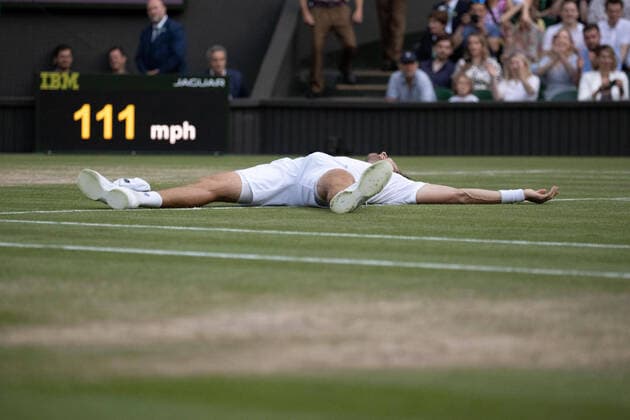 9th July 2022, All England Lawn Tennis and Croquet Club, London, England; Wimbledon Tennis tournament; Matthew Ebden (AUS) collapses after he and his doubles partner Max Purcell (AUS) celebrate winning the Gentlemen& x2019;s Doubles Final against Nikola Mektic (CRO) and Mate Pavic (CRO)  ActionPlus12407026 JohnxPatrickxFletcher