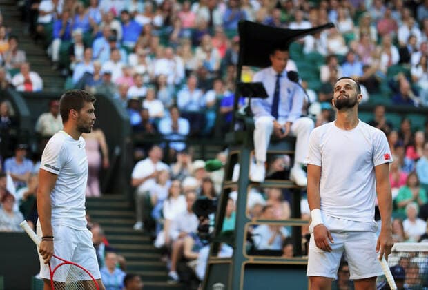 (220710) -- LONDON, July 10, 2022 -- Croatia s Nikola Mektic Mate Pavic (R) react during the men s doubles final against Australia s Matthew Ebden Max Purcell at Wimbledon Tennis Championship in London, Britain, July 9, 2022. ) (SP)BRITAIN-LONDON-TENNIS-WIMBLEDON-MEN S DOUBLES-FINAL LixYing 