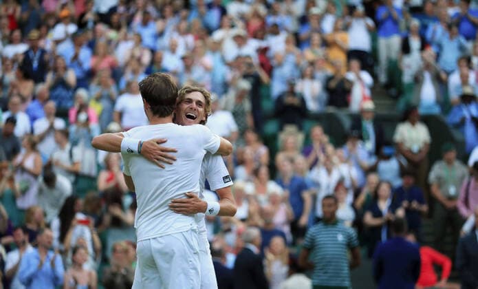 (220710) -- LONDON, July 10, 2022 -- Australia s Matthew Ebden Max Purcell (back) celebrate after winning the men s doubles final against Croatia s Nikola Mektic Mate Pavic at Wimbledon Tennis Championship in London, Britain, July 9, 2022. ) (SP)BRITAIN-LONDON-TENNIS-WIMBLEDON-MEN S DOUBLES-FINAL LixYing 