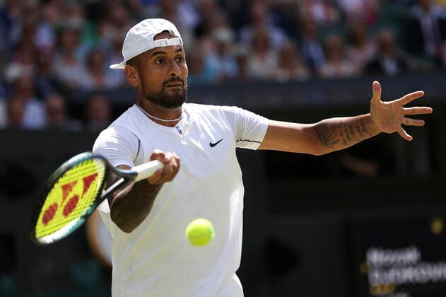 (220710) -- LONDON, July 10, 2022 -- Nick Kyrgios of Australia competes during the men s singles final against Novak Djokovic of Serbia at Wimbledon tennis Championship in London, Britain, July 10, 2022. ) (SP)BRITAIN-LONDON-TENNIS-WIMBLEDON-MEN S SINGLES-FINAL HanxYan 