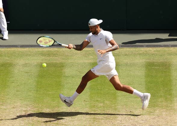 10th July 2022, All England Lawn Tennis and Croquet Club, London, England; Wimbledon Tennis tournament; Nick Kyrgios (AUS) plays a forehand to Novak Djokovic (SRB)  ActionPlus12407166 JohnxPatrickxFletcher