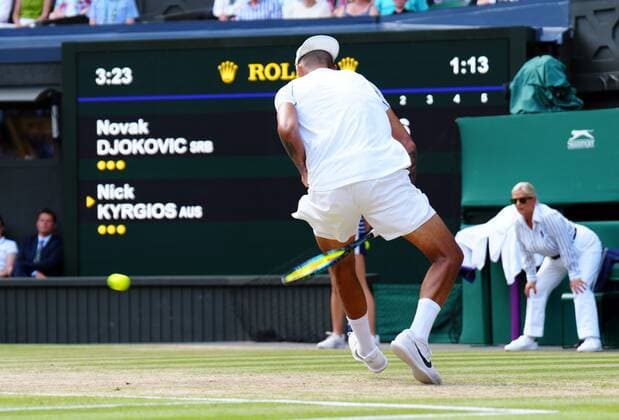 Mandatory Credit: Photo by Javier Garcia Shutterstock (13018062ci) Nick Kyrgios plays the ball between his legs during the Men s Singles Final Wimbledon Tennis Championships, Day 14, The All England Lawn Tennis and Croquet Club, London, UK - 10 Jul 2022 Wimbledon Tennis Championships, Day 14, The All England Lawn Tennis and Croquet Club, London, UK - 10 Jul 2022  Copyright: xJavierxGarcia Shutterstockx 13018062ci