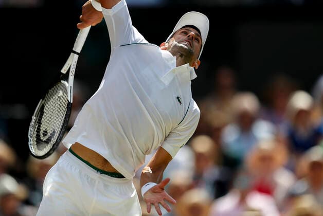 (220710) -- LONDON, July 10, 2022 -- Novak Djokovic of Serbia serves during the men s singles final against Nick Kyrgios of Australia at Wimbledon tennis Championship in London, Britain, July 10, 2022. ) (SP) BRITAIN-LONDON-TENNIS-WIMBLEDON-MEN S SINGLES-FINAL HanxYan 