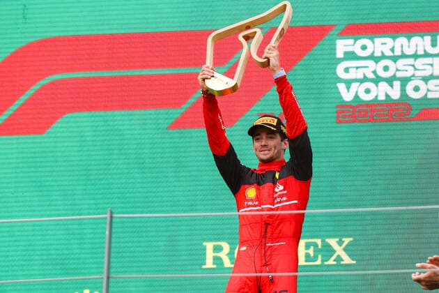 FORMULA 1 - GP of Austria 2022 SPIELBERG,AUSTRIA,10.JUL.22 - MOTORSPORTS, FORMULA 1 - Grand Prix of Austria, Red Bull Ring. Image shows the rejoicing of Charles Leclerc (MON Ferrari). Keywords: trophy.  GEPAxpictures xChristianxWalgram