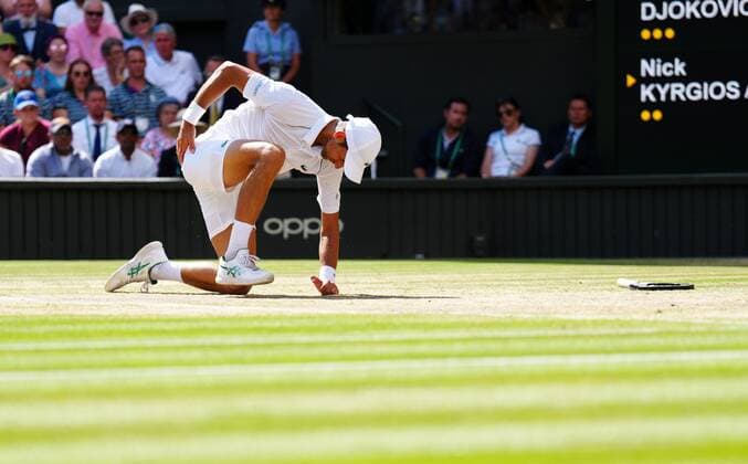 Mandatory Credit: Photo by Javier Garcia Shutterstock (13018062dj) Novak Djokovic takes a tumble during the Men s Singles Final Wimbledon Tennis Championships, Day 14, The All England Lawn Tennis and Croquet Club, London, UK - 10 Jul 2022 Wimbledon Tennis Championships, Day 14, The All England Lawn Tennis and Croquet Club, London, UK - 10 Jul 2022  Copyright: xJavierxGarcia Shutterstockx 13018062dj