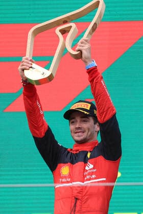 FORMULA 1 - GP of Austria 2022 SPIELBERG,AUSTRIA,10.JUL.22 - MOTORSPORTS, FORMULA 1 - Grand Prix of Austria, Red Bull Ring. Image shows the rejoicing of Charles Leclerc (MON Ferrari). Keywords: bottle.  GEPAxpictures xMarioxBuehner