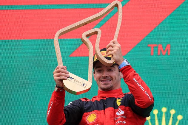 FORMULA 1 - GP of Austria 2022 SPIELBERG,AUSTRIA,10.JUL.22 - MOTORSPORTS, FORMULA 1 - Grand Prix of Austria, Red Bull Ring. Image shows the rejoicing of Charles Leclerc (MON Ferrari). Keywords: bottle.  GEPAxpictures xMarioxBuehner