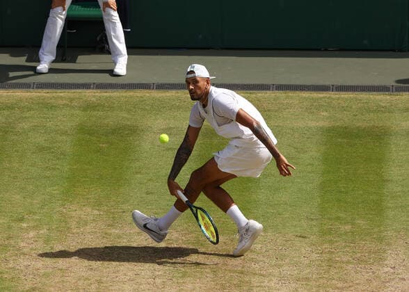 10th July 2022, All England Lawn Tennis and Croquet Club, London, England; Wimbledon Tennis tournament, mens singles final; Nick Kyrgios (AUS) plays a forehand slice to Novak Djokovic (SRB)  ActionPlus12407214 JohnxPatrickxFletcher