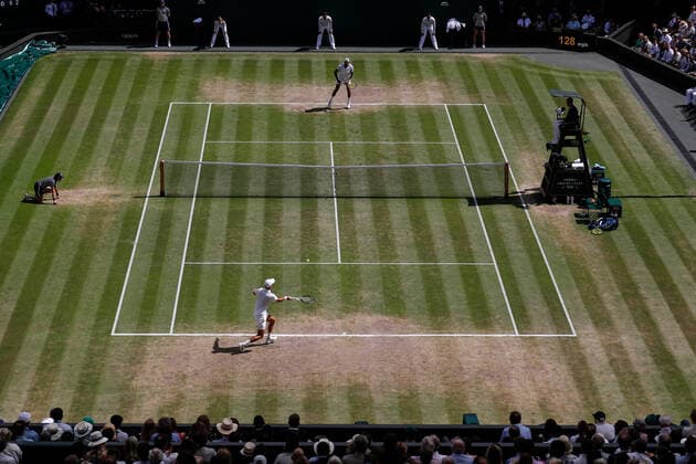 10th July 2022, All England Lawn Tennis and Croquet Club, London, England; Wimbledon Tennis tournament, mens singles final; Novak Djokovic (SRB) plays a forehand to Nick Kyrgios (AUS) in front of a packed Centre Court  ActionPlus12407231 JohnxPatrickxFletcher