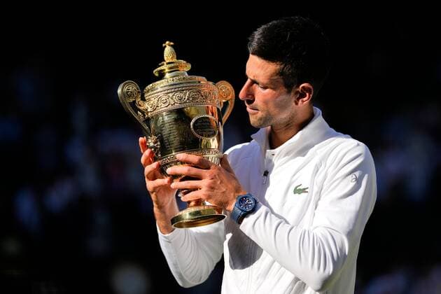Mandatory Credit: Photo by Dave Shopland Shutterstock (13018058fo) Novak Djokovic kisses the trophy after winning the Men s Singles FInal Wimbledon Tennis Championships, Day 14, The All England Lawn Tennis and Croquet Club, London, UK - 10 Jul 2022 Wimbledon Tennis Championships, Day 14, The All England Lawn Tennis and Croquet Club, London, UK - 10 Jul 2022  Copyright: xDavexShopland Shutterstockx 13018058fo