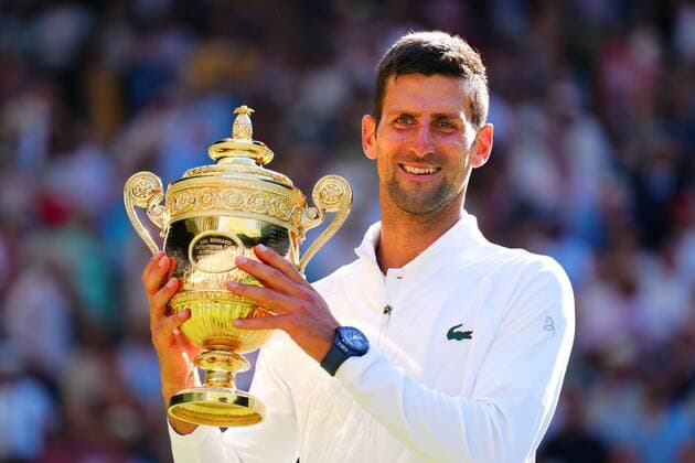 Mandatory Credit: Photo by Javier Garcia Shutterstock (13018062ey) Novak Djokovic lifts the trophy after winning the Men s Singles FInal Wimbledon Tennis Championships, Day 14, The All England Lawn Tennis and Croquet Club, London, UK - 10 Jul 2022 Wimbledon Tennis Championships, Day 14, The All England Lawn Tennis and Croquet Club, London, UK - 10 Jul 2022  Copyright: xJavierxGarcia Shutterstockx 13018062ey