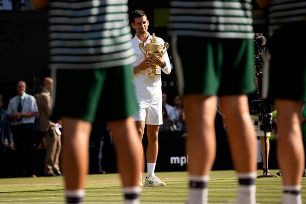 Mandatory Credit: Photo by Ella Ling Shutterstock (13018059ey) Novak Djokovic lifts the trophy after winning the Men s Singles FInal Wimbledon Tennis Championships, Day 14, The All England Lawn Tennis and Croquet Club, London, UK - 10 Jul 2022 Wimbledon Tennis Championships, Day 14, The All England Lawn Tennis and Croquet Club, London, UK - 10 Jul 2022  Copyright: xEllaxLing Shutterstockx 13018059ey