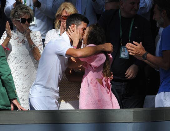Tennis Championships - Week Two - Day Fourteen - All England Lawn Tennis Club, Wimbledon - Sunday 10th July 2022 Mens Singles Final. Novak Djokovic v Nick Kyrgios Novak Djokovic climbs up into the players box to kiss his wife, Jelena after winning the match 