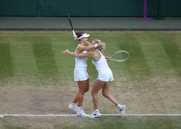 10 July 2022, All England Lawn Tennis and Croquet Club, London, England; Wimbledon Tennis tournament, womens doubles final; Barbora Krejcikova (CZE) and Katerina Siniakova (CZE) celebrate winning the Ladies Doubles Final against Elise Mertens (BEL) and Shuai Zhang (CHN)  ActionPlus12407337 JohnxPatrickxFletcher