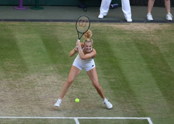 10th July 2022, All England Lawn Tennis and Croquet Club, London, England; Wimbledon Tennis tournament, womens doubles final; Katerina Siniakova (CZE) plays a backhand to Elise Mertens (BEL)  ActionPlus12407385 JohnxPatrickxFletcher