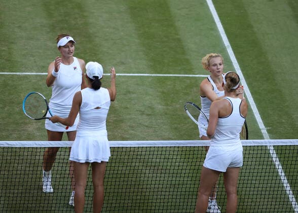 10th July 2022, All England Lawn Tennis and Croquet Club, London, England; Wimbledon Tennis tournament, womens doubles final; Elise Mertens (BEL) and Shuai Zhang (CHN) congratulate Barbora Krejcikova (CZE) and Katerina Siniakova (CZE)  ActionPlus12407398 JohnxPatrickxFletcher