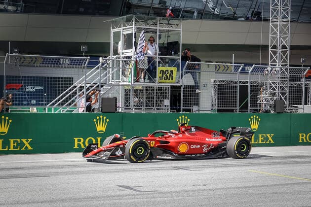 FORMULA 1 - GP of Austria 2022 SPIELBERG,AUSTRIA,10.JUL.22 - MOTORSPORTS, FORMULA 1 - Grand Prix of Austria, Red Bull Ring. Image shows Charles Leclerc (MCO Ferrari) with the checkered flag.  GEPAxpictures xManfredxBinder