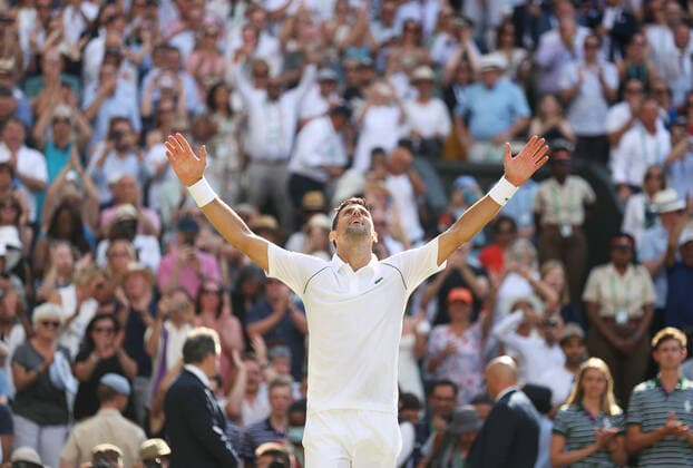 (220711) -- LONDON, July 11, 2022 -- Novak Djokovic celebrates after winning the men s singles final match between Novak Djokovic of Serbia and Nick Kyrgios of Australia at Wimbledon Tennis Championship in London, Britain, on July 10, 2022. ) (SP)BRITAIN-LONDON-TENNIS-WIMBLEDON-MEN S SINGLES-FINAL LixYing 